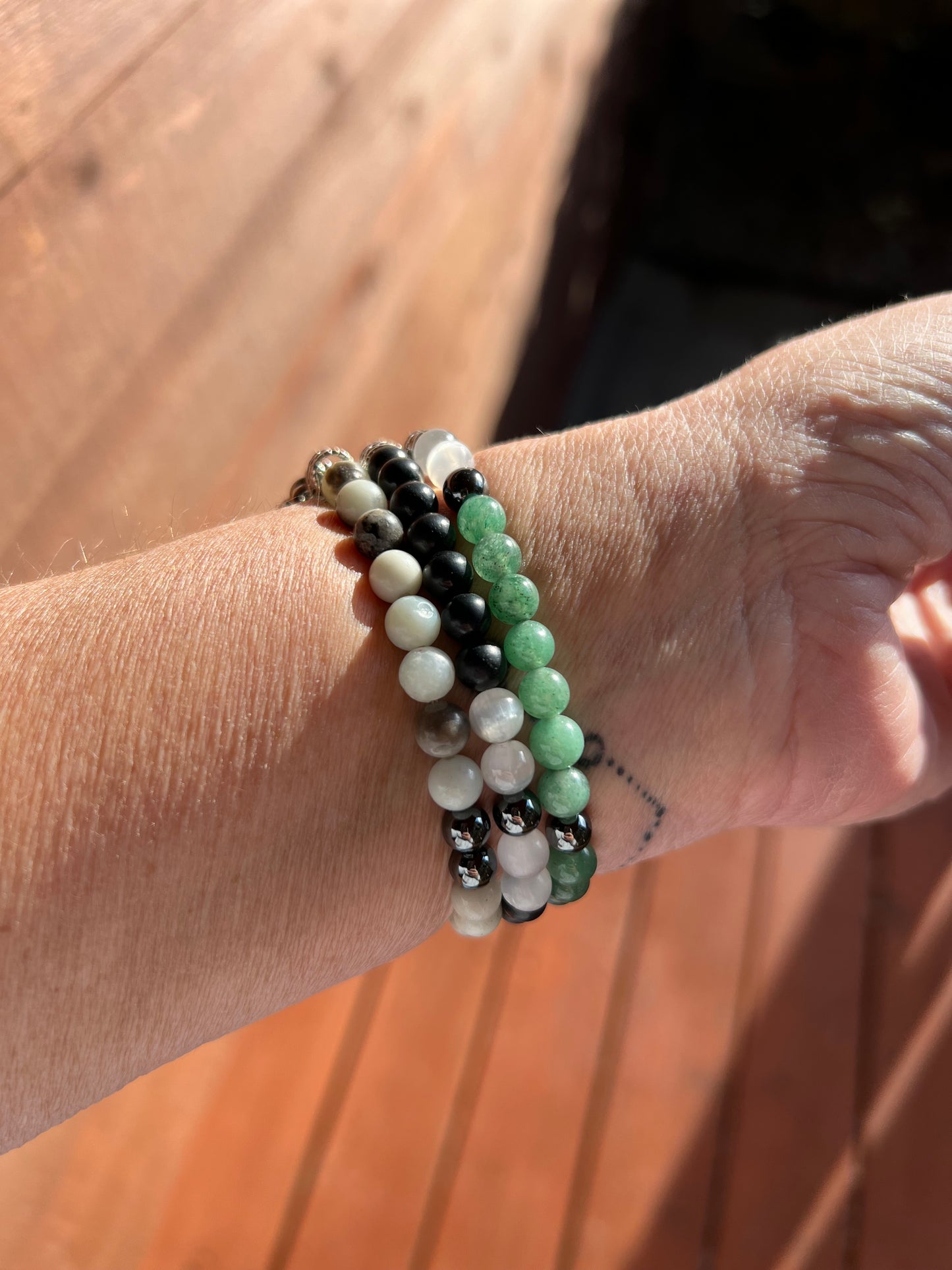 EMF protection apple watch band made with shungite, hematite, aventurine, selenite and amazonite