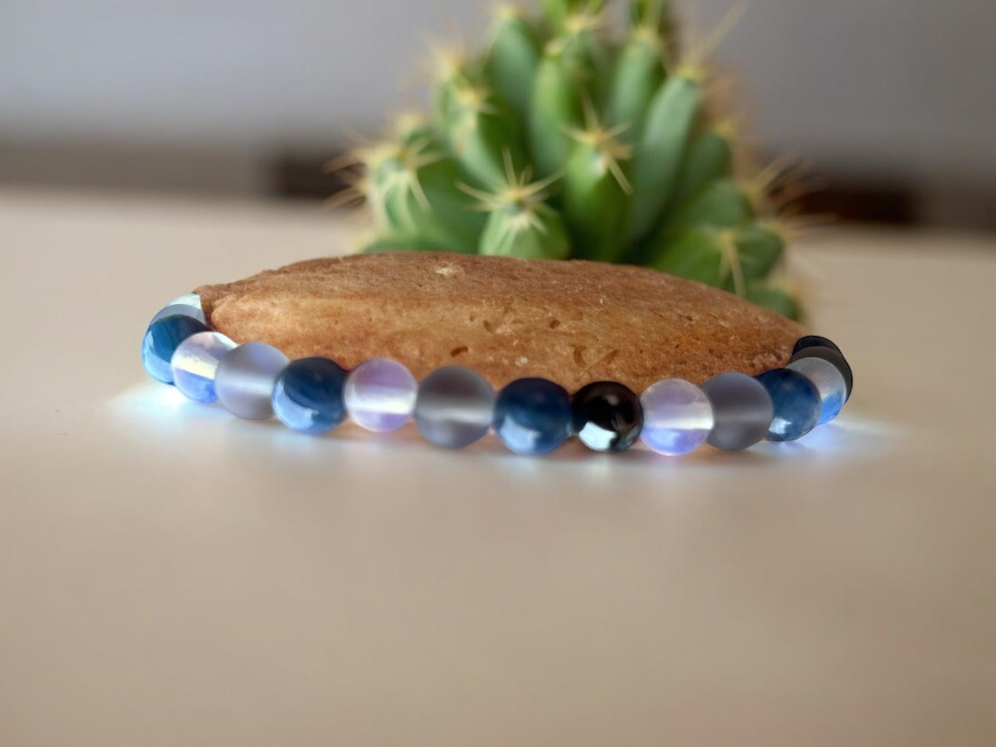 Harmony's Reverie: Kyanite, Opalite, and Aura Quartz Bracelet with Hematite